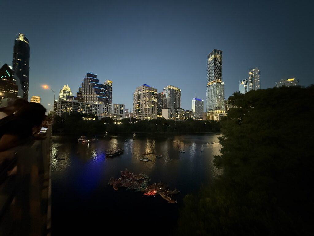 Downtown Austin skyline at night overlooking Lady Bird Lake in Central Texas.